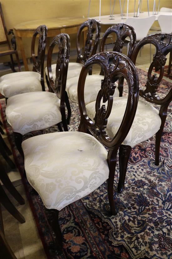 A set of six Victorian style mahogany dining chairs